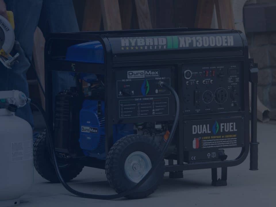 Dual Fuel Portable Propane Generator in Front of Garage